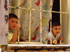 Boys Looking Through Bars In Saida